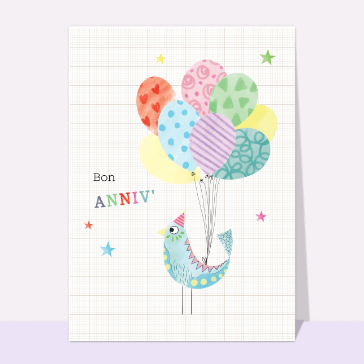 Drôle d'oiseau d'anniversaire sur un cahier