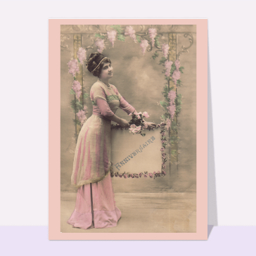Carte ancienne d'anniversaire avec une jeune femme