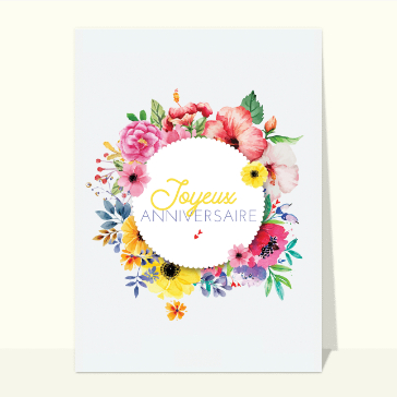 Joyeux anniversaire entouré de fleurs