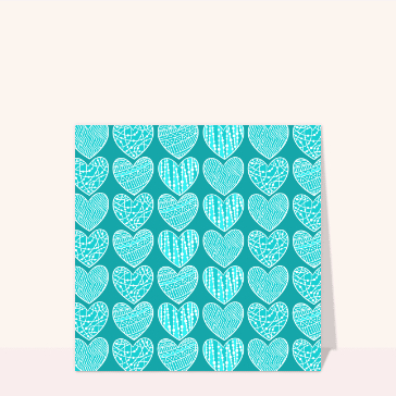 Carte Des coeurs sur fond turquoise