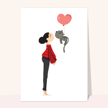 Carte Petit chat suspendu à un joli ballon coeur