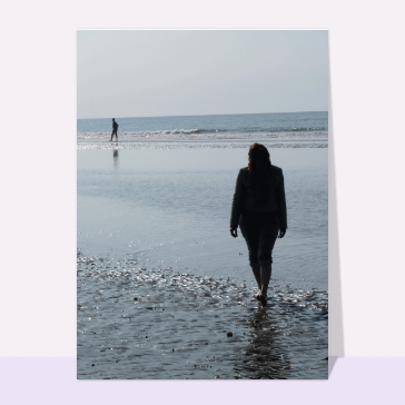 carte condoléances : Une silhouette sur la plage