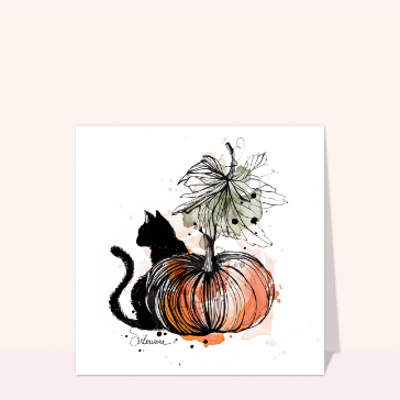 Un chat noir et une citrouille