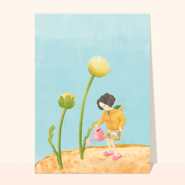 Petite fille qui arrose des pissenlits