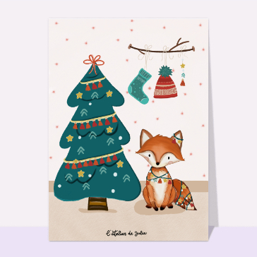 Petit renard au pied du sapin de Noël