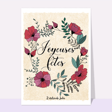 Joyeuses fêtes entourée de fleurs rouges