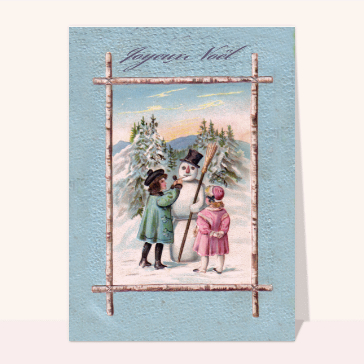 Les petits enfants font un bonhomme de neige