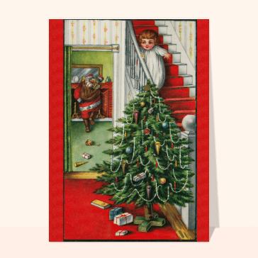 Un enfant qui surprend papa noël