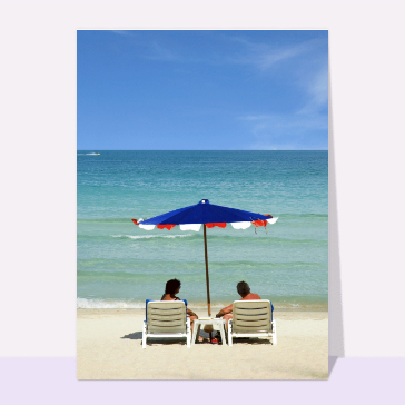 carte de vacances : Transat et parasol au bord de la mer